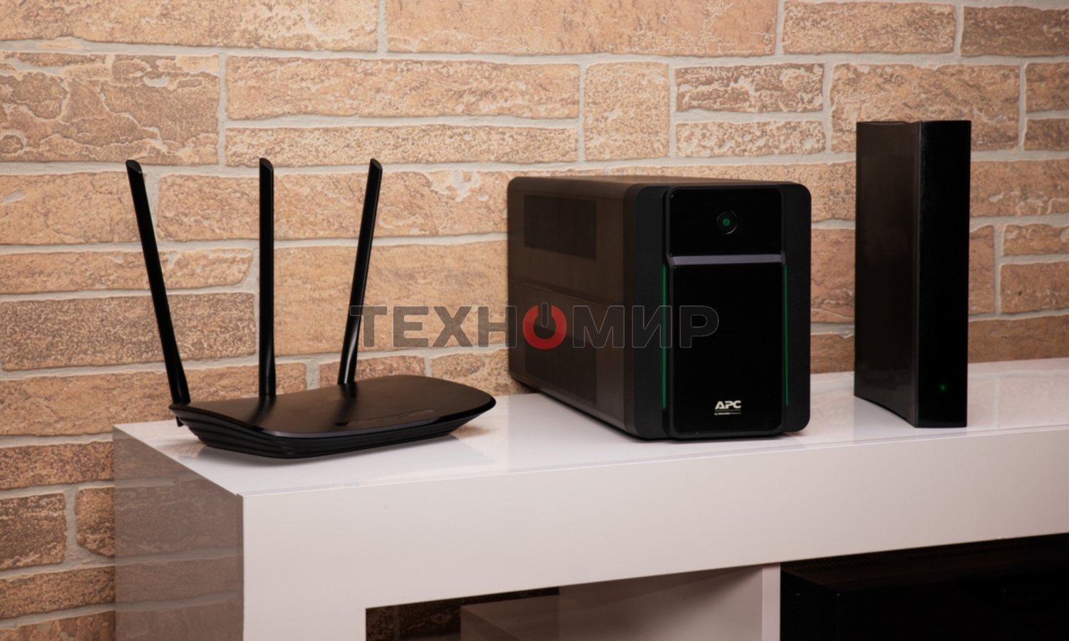 Источник бесперебойного питания APC Back-UPS BX1200MI 650Вт 1200ВА черный